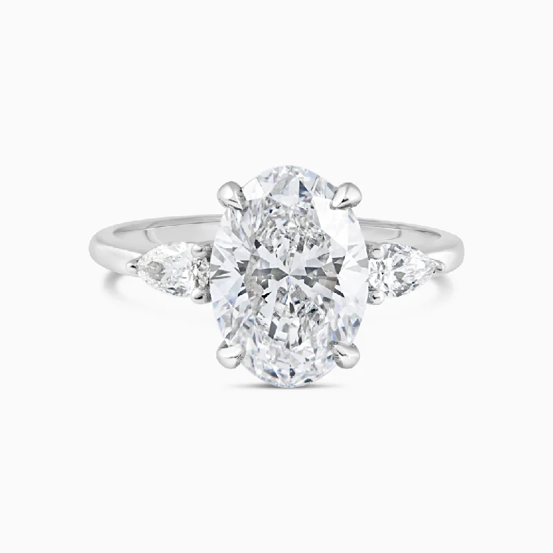 women’s gold diamond engagement rings-Oval & Pears Diamond Ring